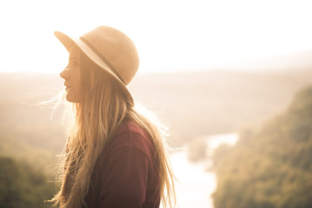 side profile of a long-haired woman, featured image